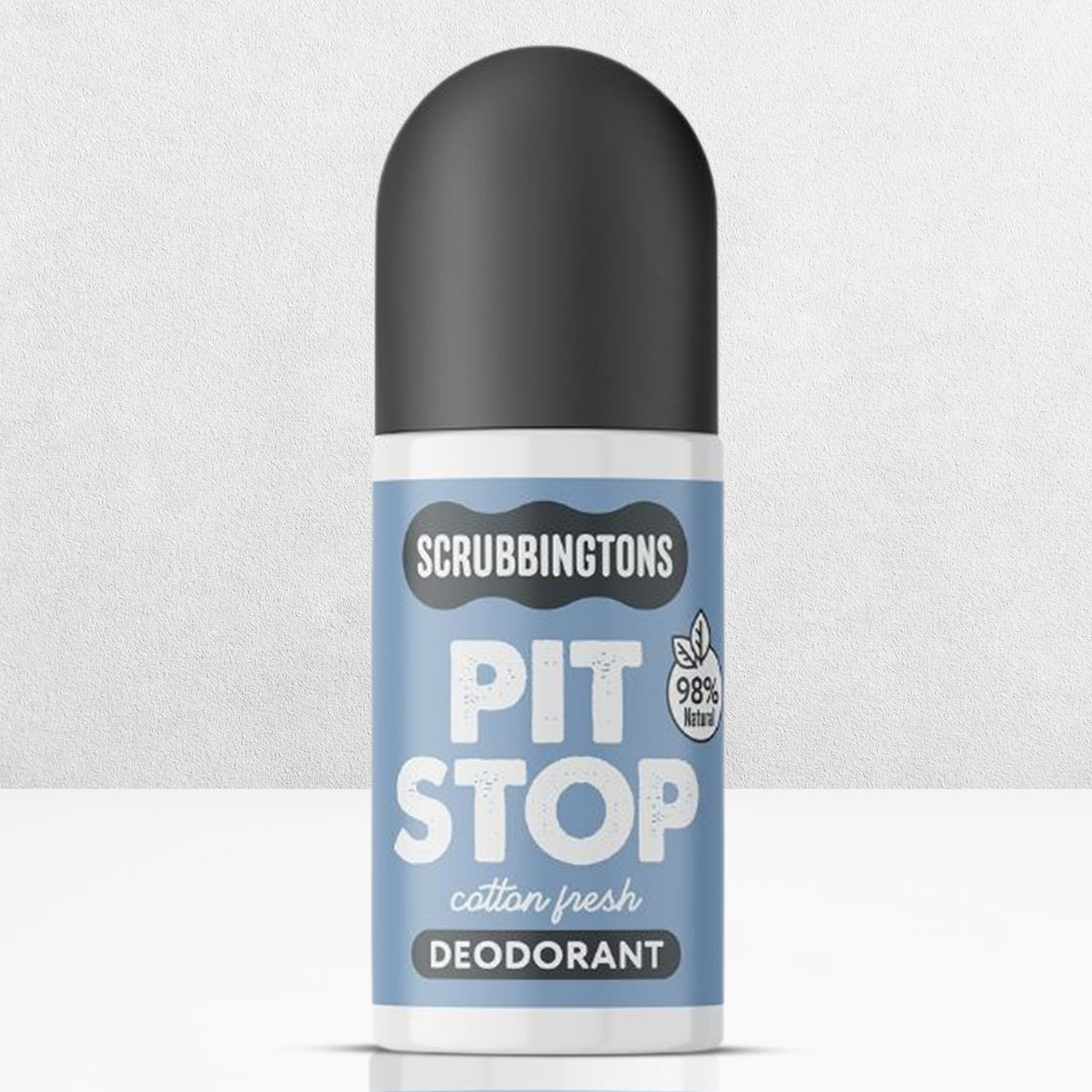 Deodorant bottle labeled 'Scrubbingtons Pit Stop' on a light grey background